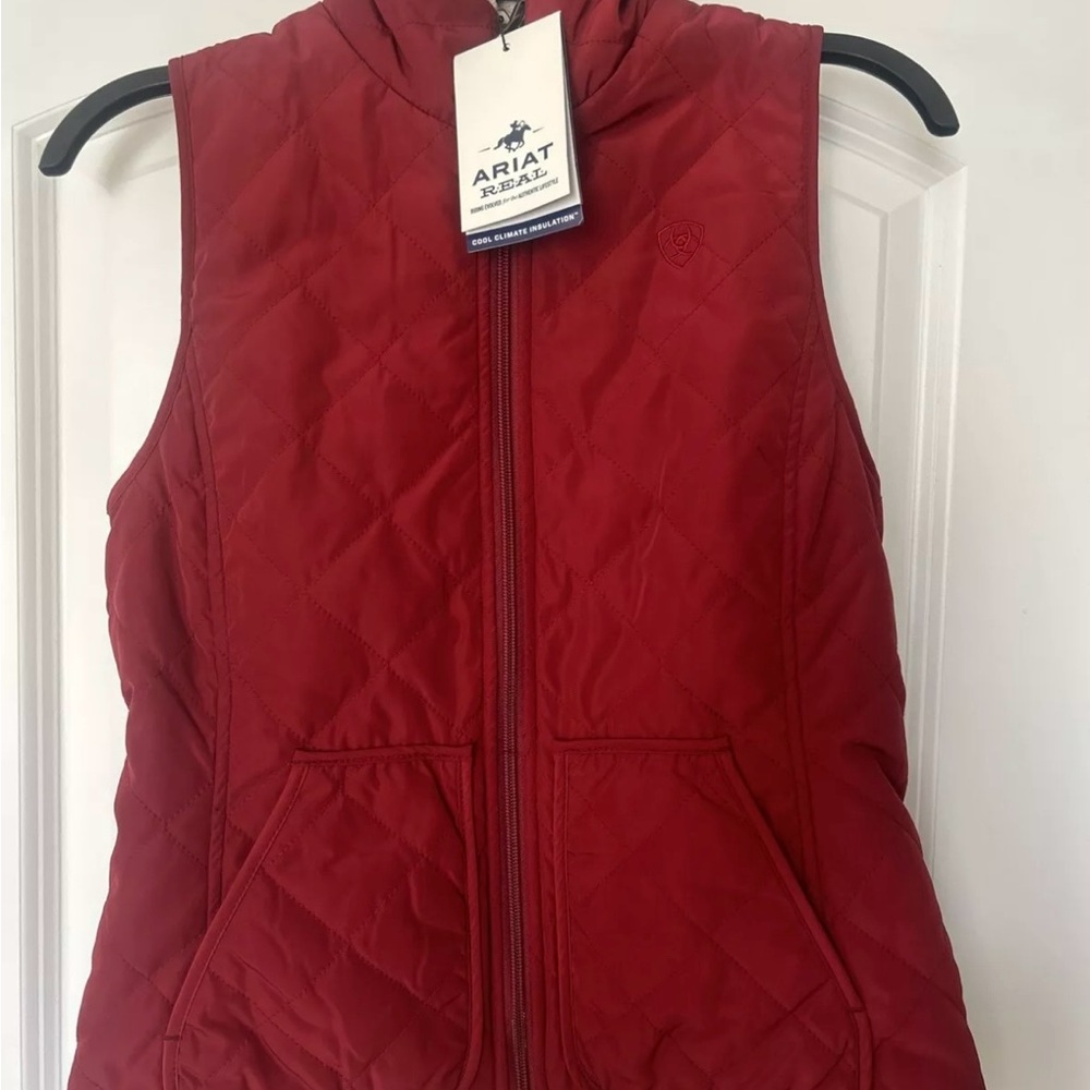 Brand new with tags Ariat reversible vest. Rouge red size large